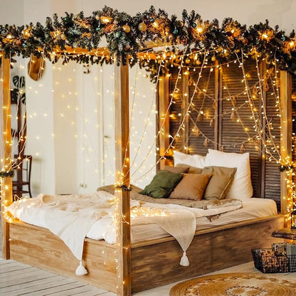 Warm white LED curtain string lights along window and bed area in a bedroom