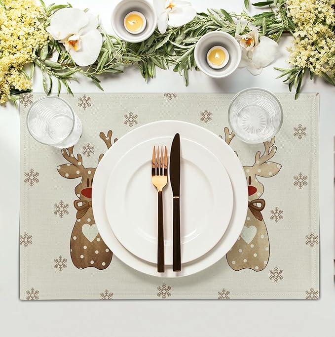 Beige reindeer snowflake placemat with brown elk figures under a white plate