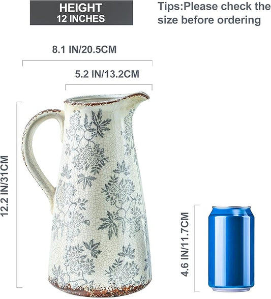 Blue and white ceramic pitcher vase, double handles, patterned body with speckled rim base