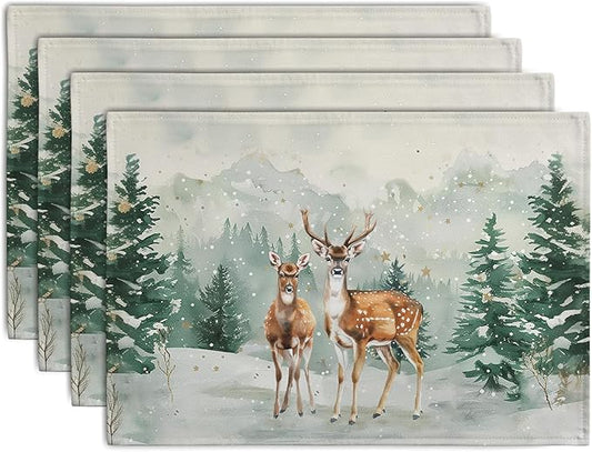 Set of linen-look Christmas placemats, deer and snowy pine forest watercolor scene