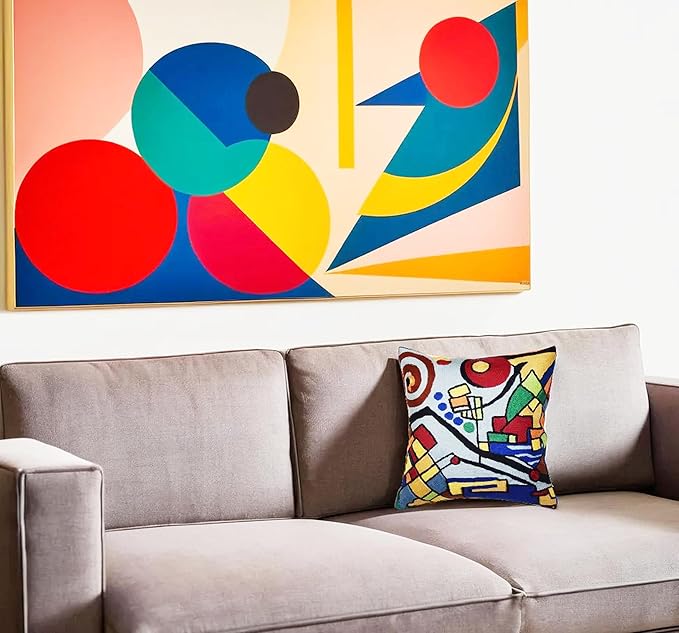 Embroidered abstract geometric pillow cover with multicolor shapes on light base
