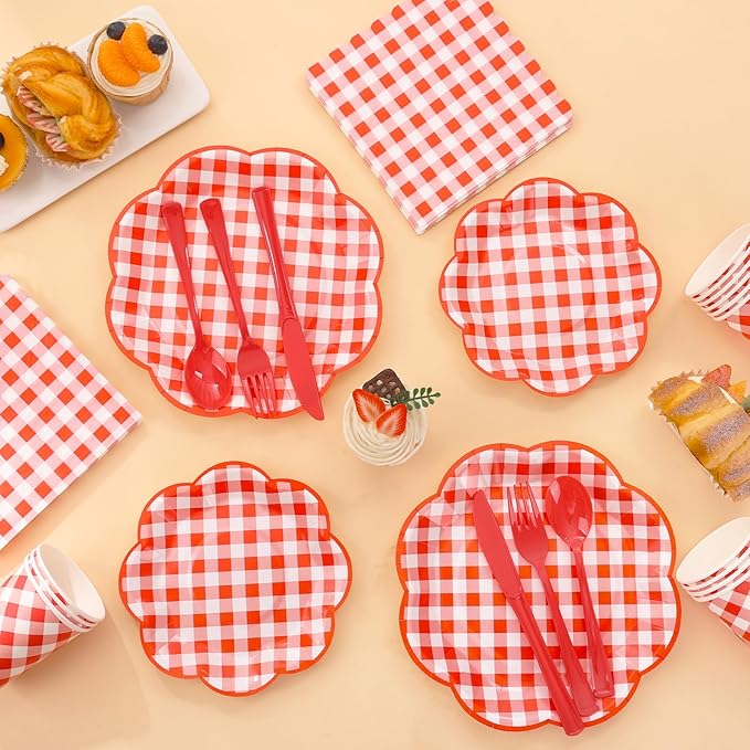 Red and white gingham plates with red plastic forks and knives, plus napkins and cups
