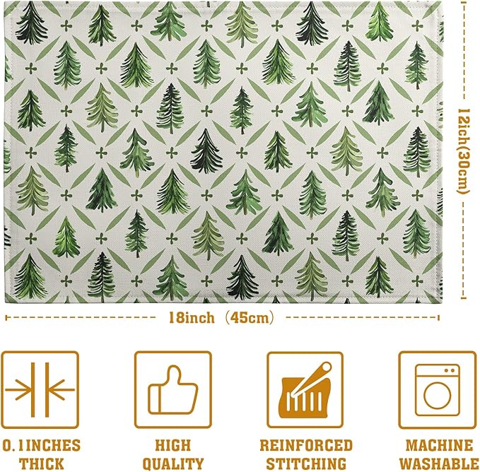 Single rectangular placemat with sage green pine tree and cross pattern on a light background.