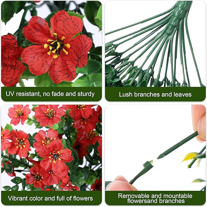 Close-up of red faux blossoms with green leaves and long trailing stems