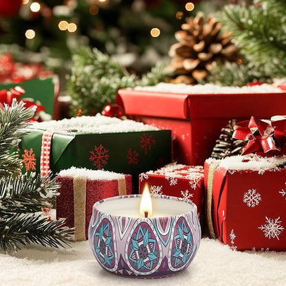 Patterned ceramic jar candle with a lit wick on a holiday table setting