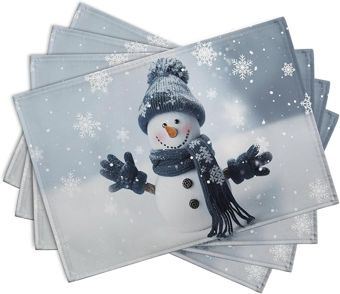 Blue snowman placemats stacked, snowflake pattern and snowman figure, set of 4