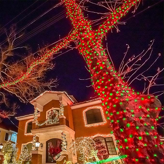 Outdoor Christmas tree string lights with red and green bulbs on branches