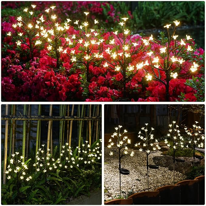 Solar flower LED garden lights, warm white glowing blooms across a flower bed