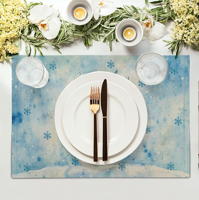 Blue snowman winter placemat with snowflake pattern, rectangular, used under dinner plate.