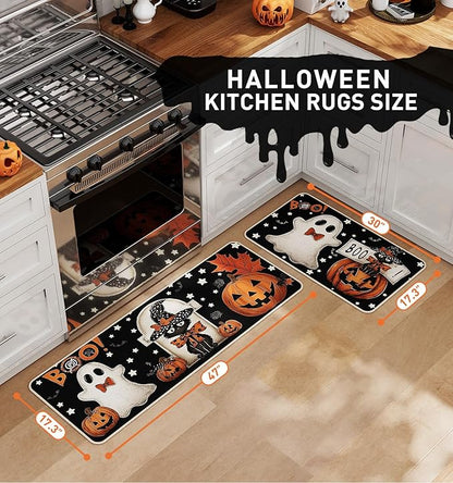 Halloween kitchen rug set on floor with ghost and jack-o'-lantern cartoon motifs