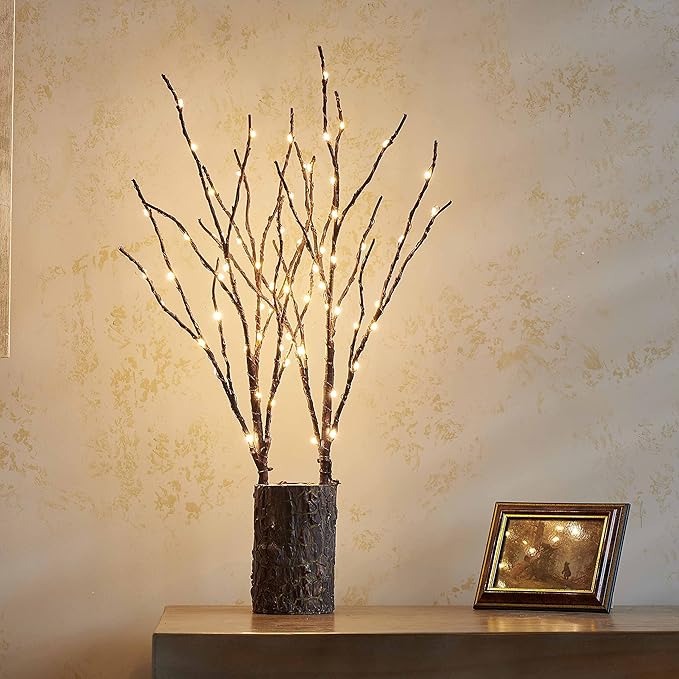 Brown lighted willow branches with warm white LEDs in textured pot on side table