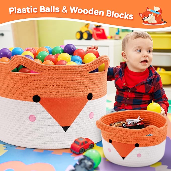 Orange and white woven basket with fox face design, holds toys and plastic balls
