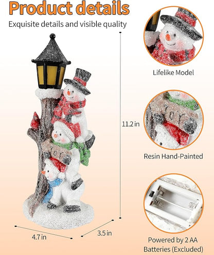 Resin hand-painted stacked snowman figurine with black lantern light and snowy base