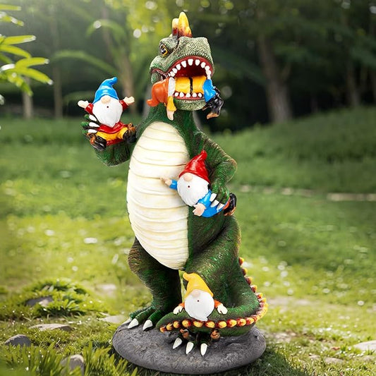 Green dinosaur gnome garden statue with open mouth and red-hatted gnomes on a gray base