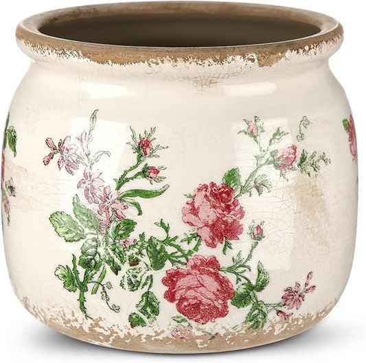 Ceramic planter with pink and green rose floral print and beige speckled rim
