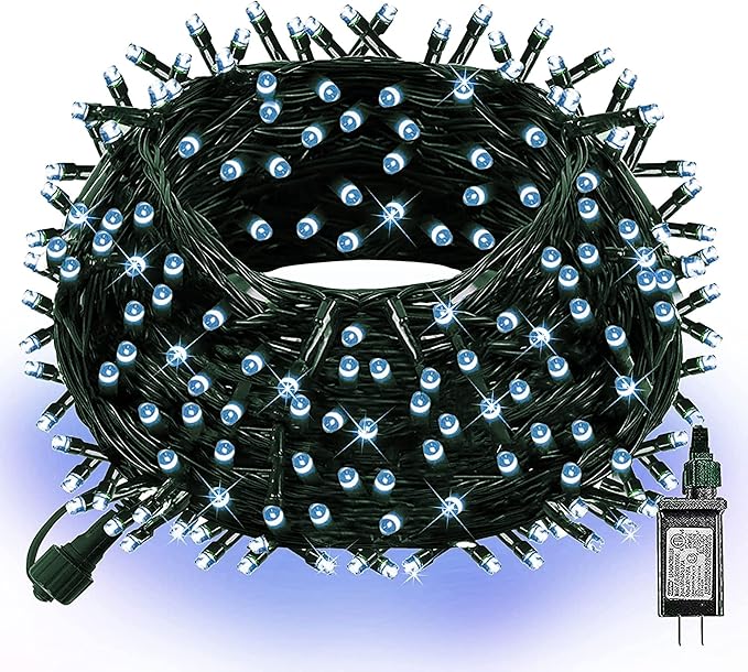 Christmas LED string lights with cool white bulbs on green wire, many mini bulbs visible