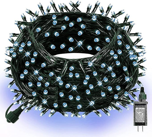 Christmas LED string lights with cool white bulbs on green wire, many mini bulbs visible