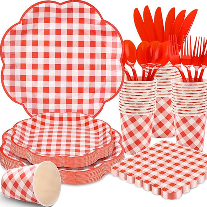 Red and white gingham picnic tableware set with plates, cups, and red cutlery stacks