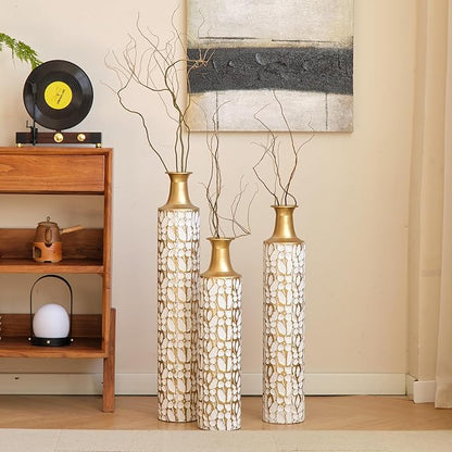 Set of three antique white metal floor vases with gold tops and twig pattern