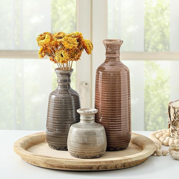 Set of 3 ceramic vases with ribbed texture in terracotta brown, gray, and cream