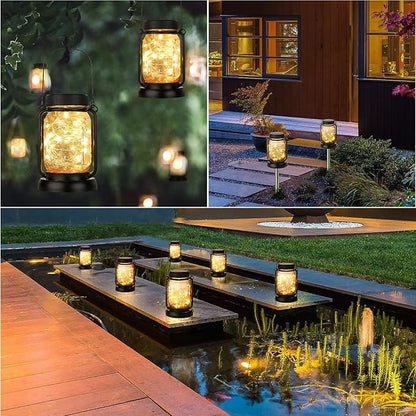 Solar mason jar lanterns with warm glow near a house and garden pathway at night