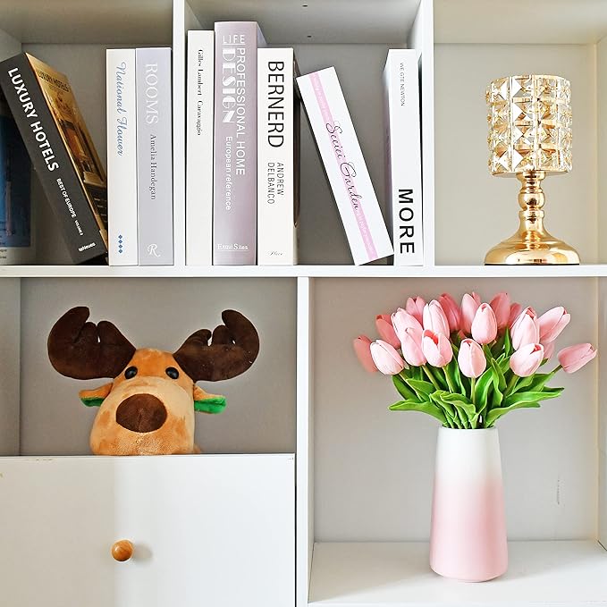 Light pink faux tulip bouquet in gradient pink vase on a shelf unit