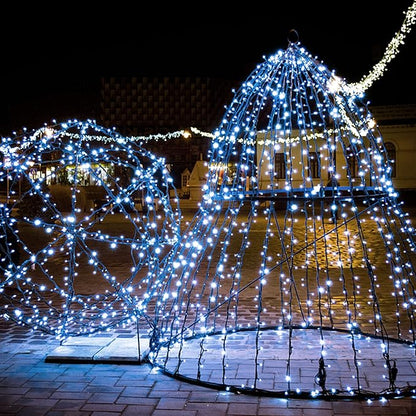Outdoor mini LED string lights with bright white bulbs draped over a structure.