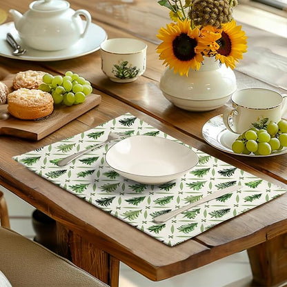 Rectangular pine tree table mat with sage green repeating motif, suited for indoor dining.
