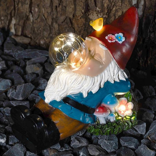 LED solar gnome garden statue holding a glowing bubble sphere, red hat, white beard, blue outfit