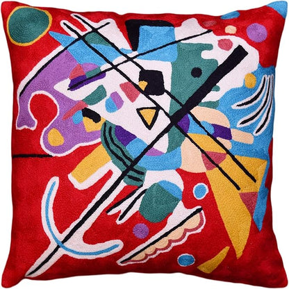 Red abstract art pillow cover with multicolor shapes and bold black intersecting lines