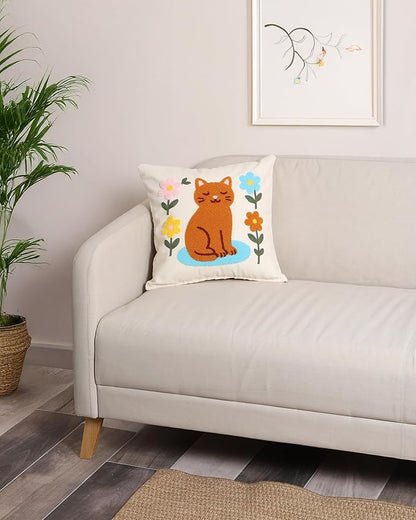 Cream sofa pillow cover with embroidered orange cat and spring flower accents
