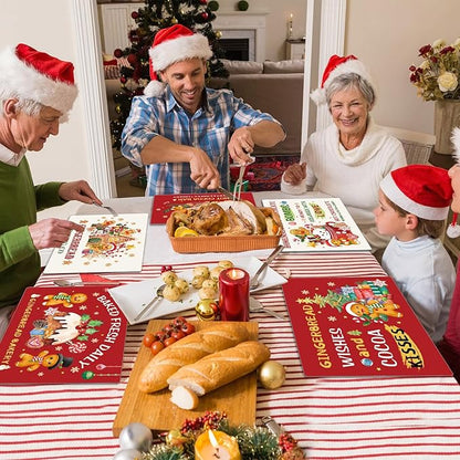 Christmas gingerbread themed table mats on holiday dining table, red borders with gingerbread graphics