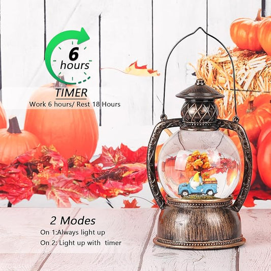 Glitter snow globe lantern with timer, black handle top, blue truck and gnome inside
