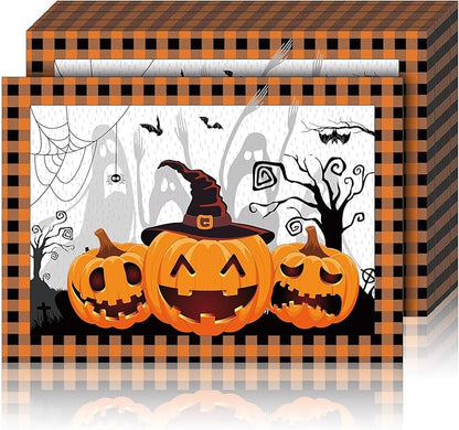 Black and orange plaid Halloween paper placemat with pumpkins, ghost and spiderweb print