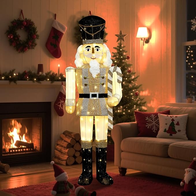 Lighted nutcracker decoration with sparkling gold coat, white beard, black hat, glowing LEDs