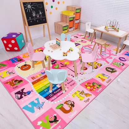 Pink kids learning rug with alphabet blocks, animal shapes, and colorful play paths.