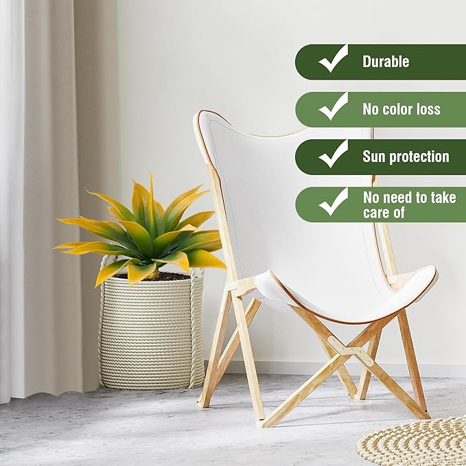 Yellow-green faux agave plant in woven planter with light wood faux trunk stem