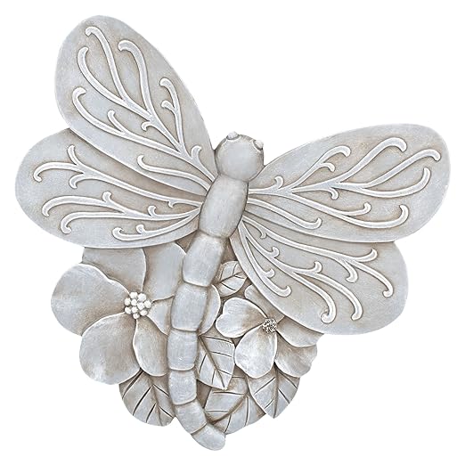 Grey dragonfly cast resin stepping stone with raised wings and floral accents