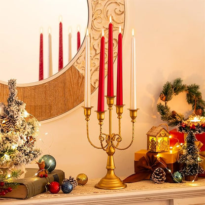 Gold 5-arm metal candelabra with five taper candles in red and cream