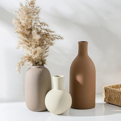 Set of 3 ceramic vases, matte finishes: cream round, light stone, and terracotta
