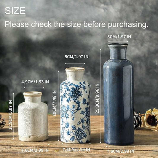 Set of 3 ceramic vases shown together: dark blue, cream, and blue-and-white
