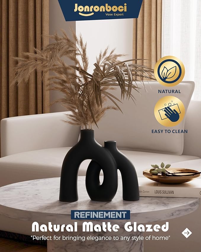 Matte black ceramic hug vase, two joined forms with oval voids
