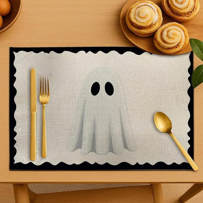 Off-white ghost placemat with scalloped black border, rectangular polyester table mat
