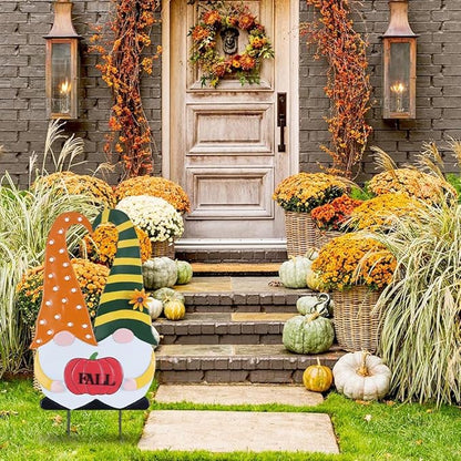Outdoor fall gnome yard stake with orange polka-dot robe, green striped hat, and “FALL” pumpkin