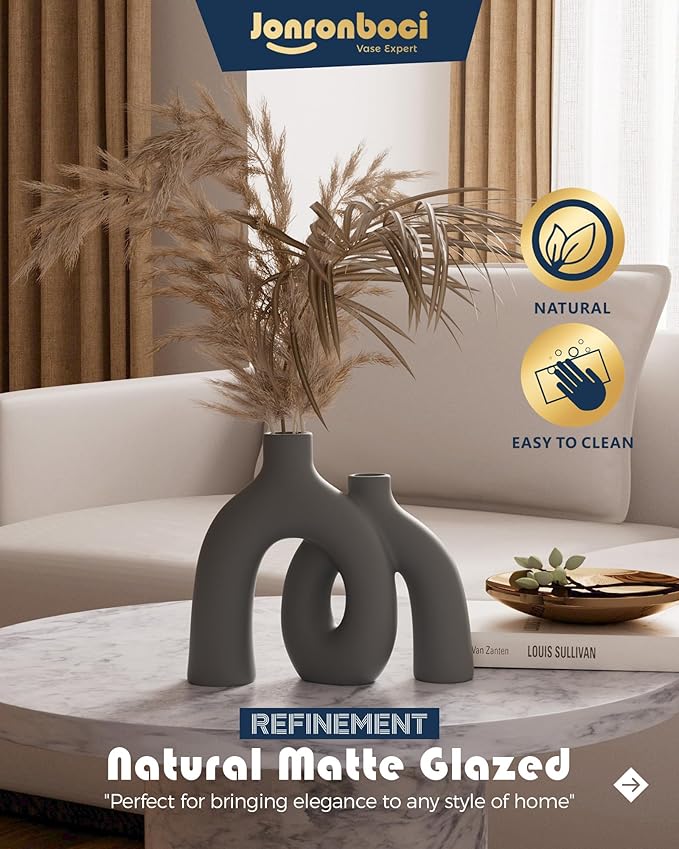 Dark gray matte ceramic conjoined vase with oval donut cutout, standing decor