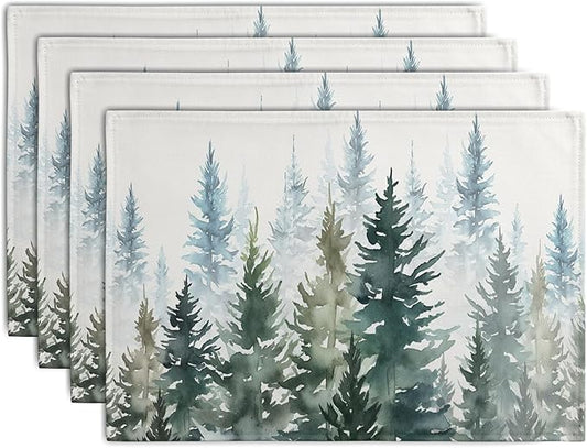 Set of 4 watercolor pine tree table mats, dark green and blue forest design, white border