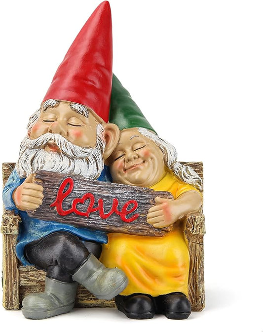 Romantic garden gnome couple statue hugging and holding a red Love sign