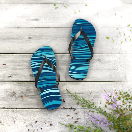 Blue ocean-wave flip flops with black straps and textured non-slip sole