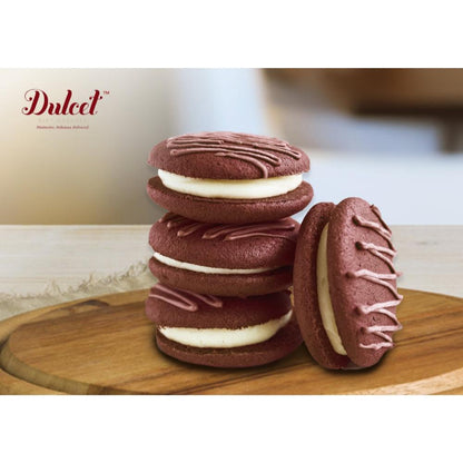 Chocolate sandwich cookies with white filling and piped chocolate drizzle