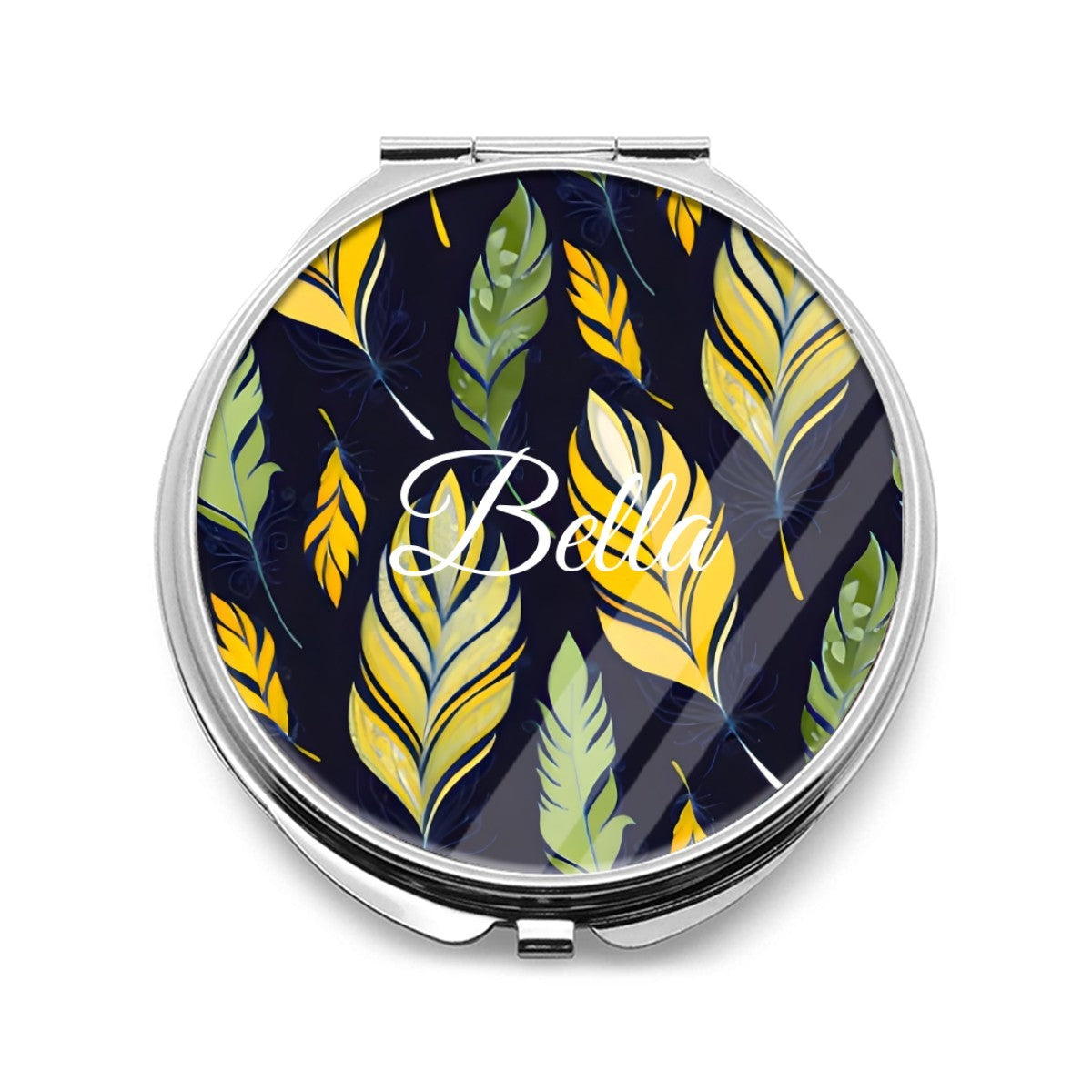 Round silver compact mirror with a colorful feather pattern and Bella lettering